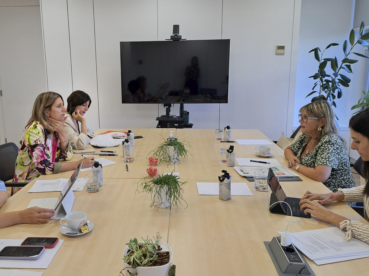 Masks hanging on a clothes line.